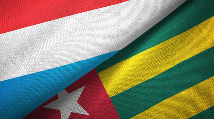 Luxembourg and Togo two flags textile cloth, fabric texture