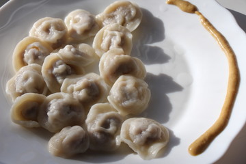 Meat dumplings. Russian pelmeni on plate