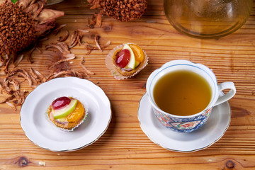 fruit tart and beverages on wood table