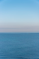 Tiny Fishing Boat on the Southern Italian Mediterranean Sea at Sunrise