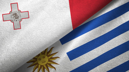 Malta and Uruguay two flags textile cloth, fabric texture