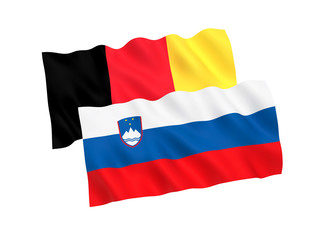 National fabric flags of Belgium and Slovenia isolated on white background. 3d rendering illustration. 1 to 2 proportion.