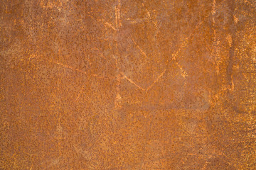 A rusty metallic dirty corroded red background wall for text and food. Abstract texture conceptual grunge iron for design and decoration