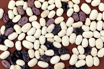 Soybean beans close-up on brown background. Source of protein, vegetarian.