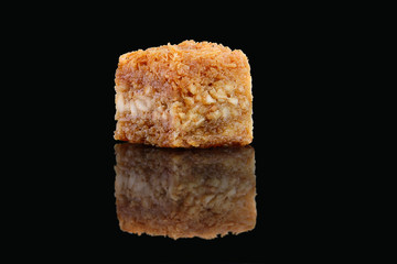 Middle eastern, Turkish sweet pastry baklava isolated on black background