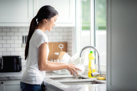 Lady Washing Dishes Images – Browse 3,651 Stock Photos, Vectors, and Video