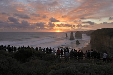 Silhouette of Tourists looking at the Twelve Apostles Great Ocean Road in Victoria Australia