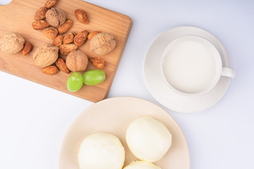 Dried fruit and milk bread on a white background