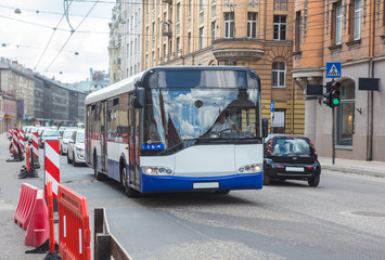 City Bus Moves on the Street