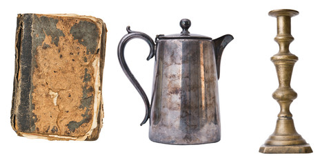 Set of 3 gorgeous old vintage items. Book, candlestic, teapot. Isolated on white background.