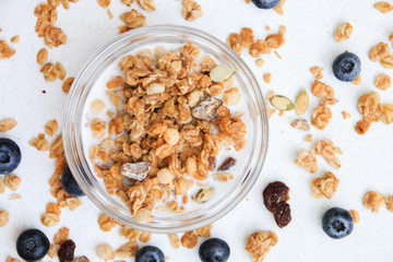 Crunchy muesli and blueberry Breakfast cereals isolated on white background, selective focus, top view