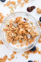 Crunchy muesli and blueberry Breakfast cereals isolated on white background, selective focus, top view