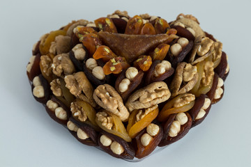 the special dried fruits and nuts plate concept for store seller. dried apricot,fig ,hazelnut, nut,special Turkish east food.