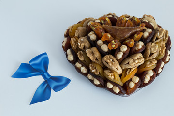 the special dried fruits and nuts plate concept for store seller. dried apricot,fig ,hazelnut, nut,special Turkish east food.