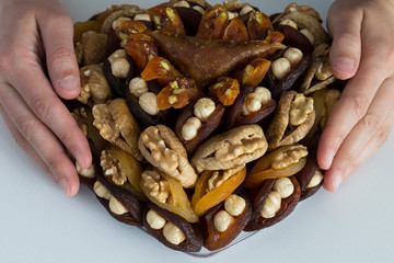 the special dried fruits and nuts plate concept for store seller. dried apricot,fig ,hazelnut, nut,special Turkish east food.