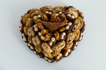 the special dried fruits and nuts plate concept for store seller. dried apricot,fig ,hazelnut, nut,special Turkish east food.