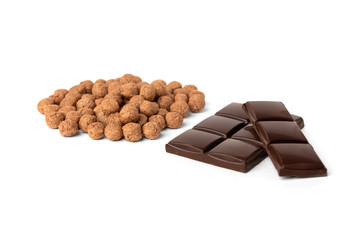 Chocolate dried balls and chocolate bar isolated on white  background.