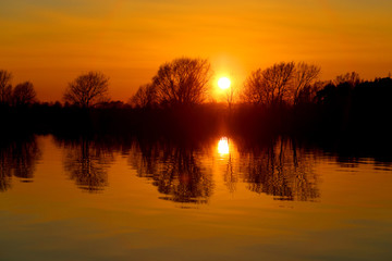 Fototapeta na wymiar Beautiful sunset on the Volkhov river in Novgorod Russia