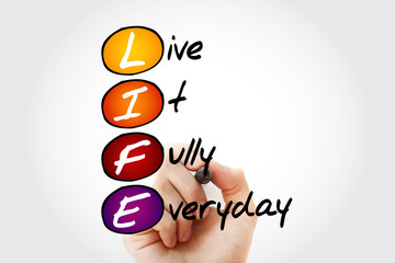 Fototapeta premium LIFE - Live It Fully Everyday, acronym with marker, business concept