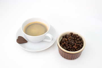 Freshly made coffee with pot of coffee beans