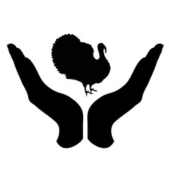 Vector silhouette of a hand in a defensive gesture protecting a turkey. Symbol of animal, farm, poultry, humanity, care, protection.