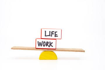 Work life balance concept with two blocks representing work and life