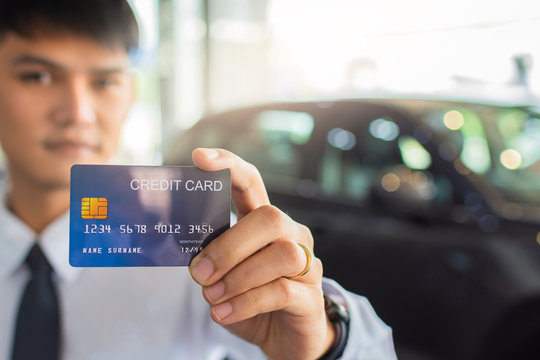 man holding credit card for blurred bokeh background e-shopping marketing digital, consumer purchase shopping internet online image