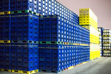 plastic colorful beer crates stacked