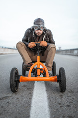 Ride car driver on the road with your tricycle - 264377955