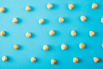 Nuts pattern - hazelnut on white background.