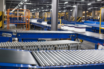 Factory roller conveyor system for transporting crates