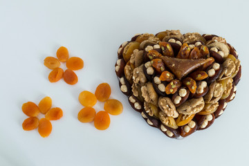 the special dried fruits and nuts plate concept for store seller. dried apricot,fig ,hazelnut, nut,special Turkish east food.