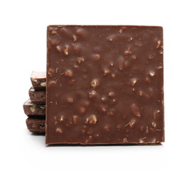 Chocolate with hazelnuts isolated on white background
