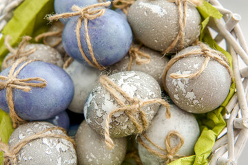 Obraz premium Colored grey and blue decorated Easter Eggs