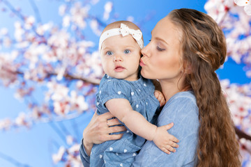 Obraz premium mother hugs a young child