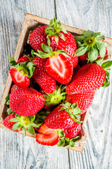 Fresh strawberry on wooden box, copy space