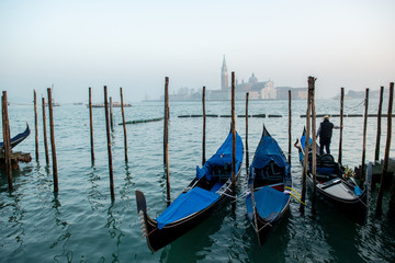 Obraz na płótnie Canvas Grand Сhannel with gondola and gondolier, Venice, Italy. Beautiful ancient romantic italian city.