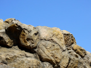 stone of mountain with blue sky