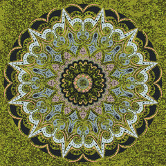 A strict geometric mandala on military - background, green-gray tones. Interior in the style of a loft, decor in the men's room, the boy's office. Symmetry, harmony, floral motif.