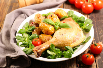 grilled chicken leg and potato