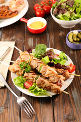 grilled skewer meat and lettuce