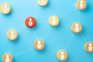 Wooden cubes with businessman icon on blue background, Organisation structure, social network, Leadership, team building, recruitment business, management and human resources concept