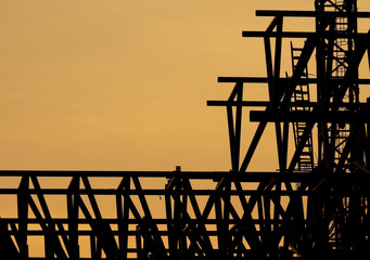 Silhouette steel structure in the construction site