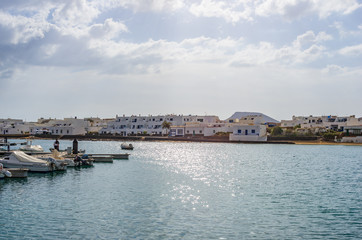 Fototapeta na wymiar Seaport of Caleta de Sebo in La Graciosa island