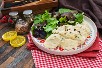 Traditional Parmentier of fish with chives