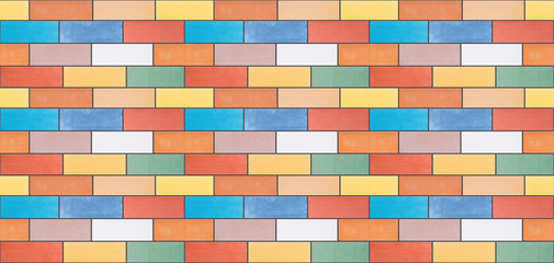 A seamless texture from multi-colored ceramic bricks made in a wall