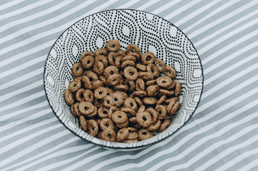 Bowl of cereals on the table, Breakfast Cornflakes, healthy food in the morning