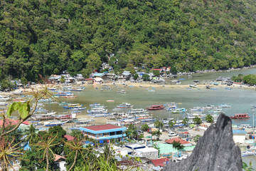 A small town which became a tourist destination because of the beautiful islands and outdoor activities. View seen from Taraw Cliff in El Nido, Palawan, Philippines.