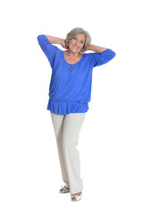 Fototapeta premium Full length, happy senior woman posing, isolated