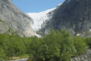 Green valley and Glacier Briksdal. Olden, Norway
